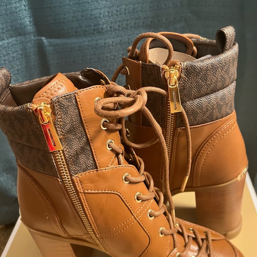 Brand new just tried on. Never been worn. Very stylish boots. New, negotiable